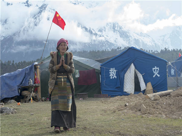 】新华社记者西藏灾区影像pg电子中国【凤凰涅槃(图2)