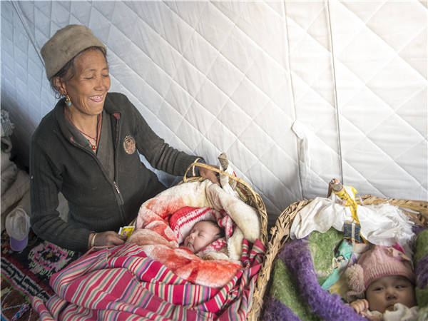 】新华社记者西藏灾区影像pg电子中国【凤凰涅槃(图3)